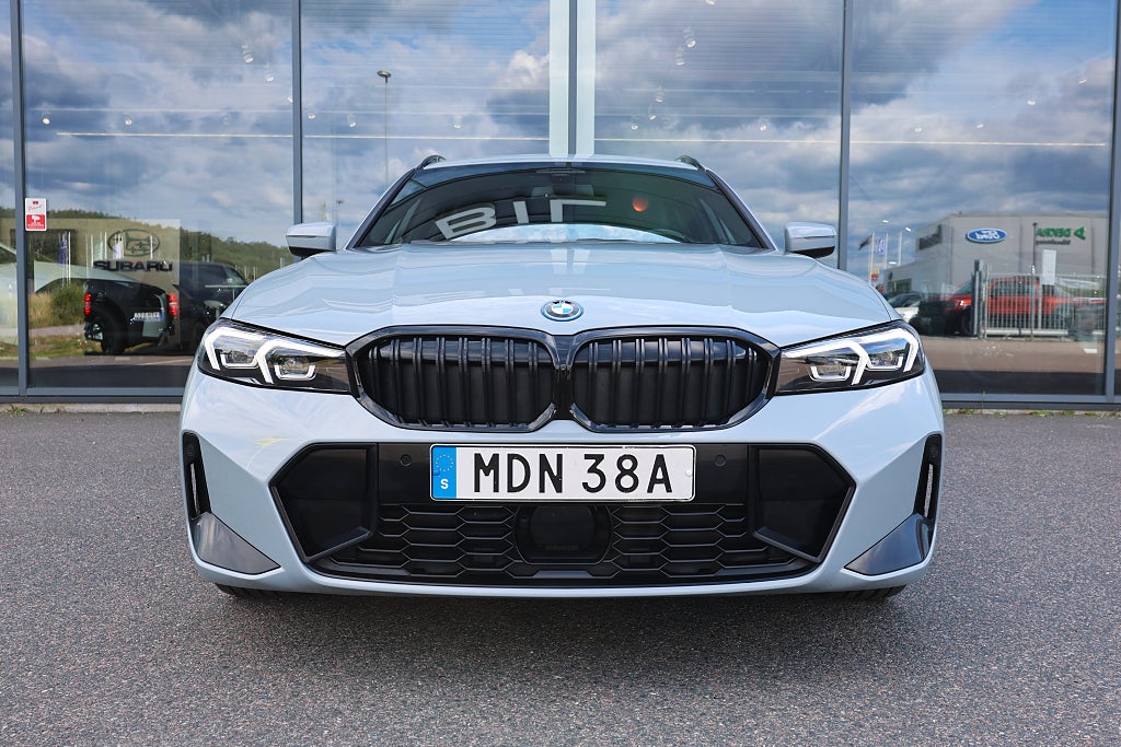 BMW 330e M-sport xDrive Touring Steptronic Drag