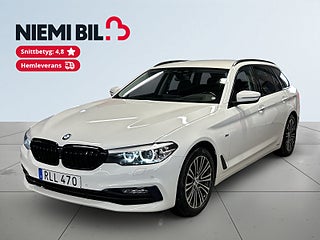 BMW 520d Touring Steptronic Sport line 360°/S&V-Däck/Halvskinn – bild 1