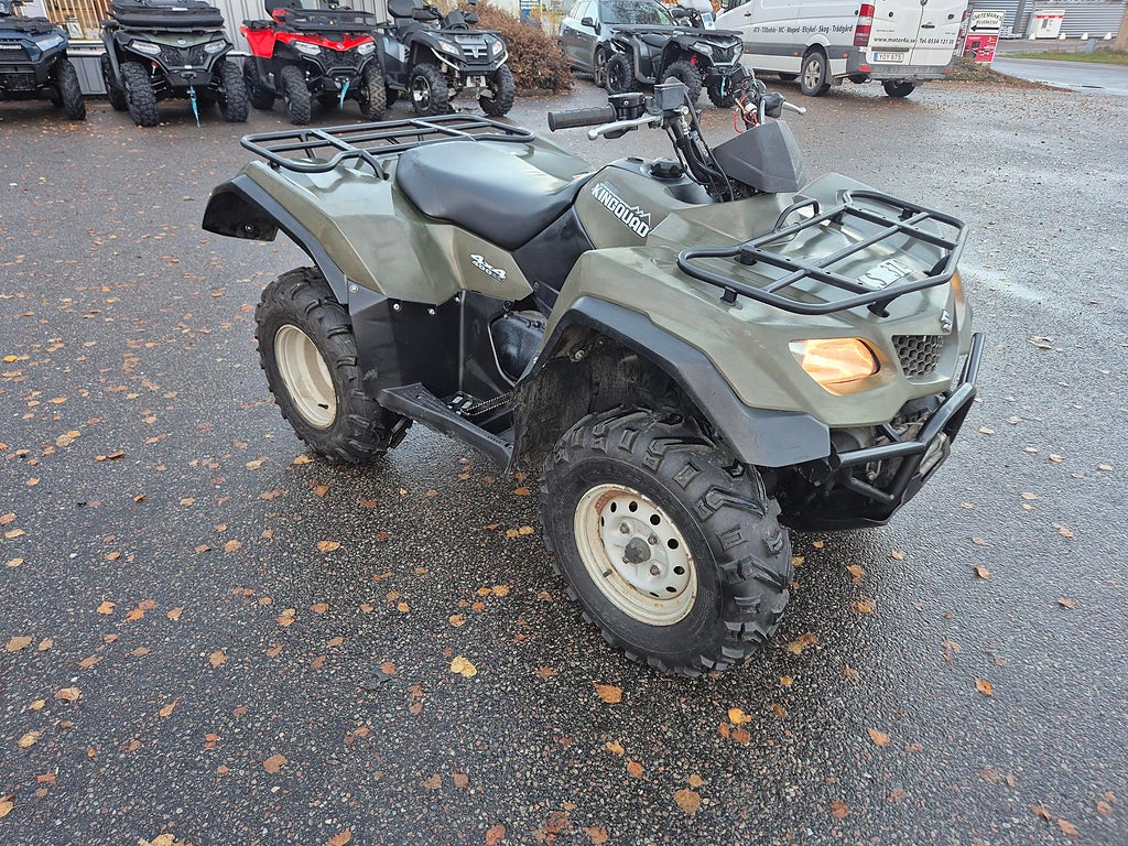Suzuki LTA 400 med plog 