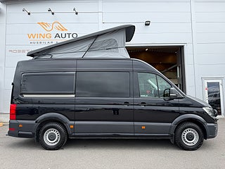 Husbil-halvintegrerad Volkswagen Crafter 177HK AUT (5 bältad) Pop-up tak & soffa/dubbelsäng bak 1 av 21
