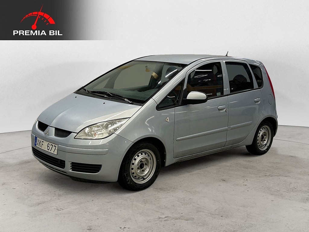 Mitsubishi Colt 1.3 MIVEC Nybesiktigad Nyservad Vinterdäck 