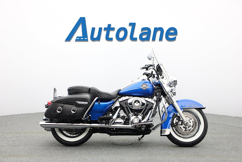 Harley-Davidson Road king Clasic * Vance & Hines sidoväskor motorbåge