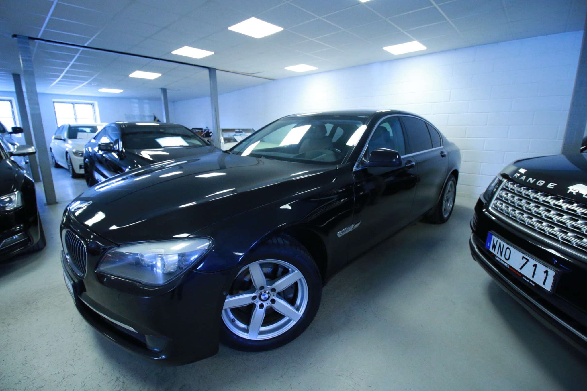 BMW 740 2010, bild 2/40