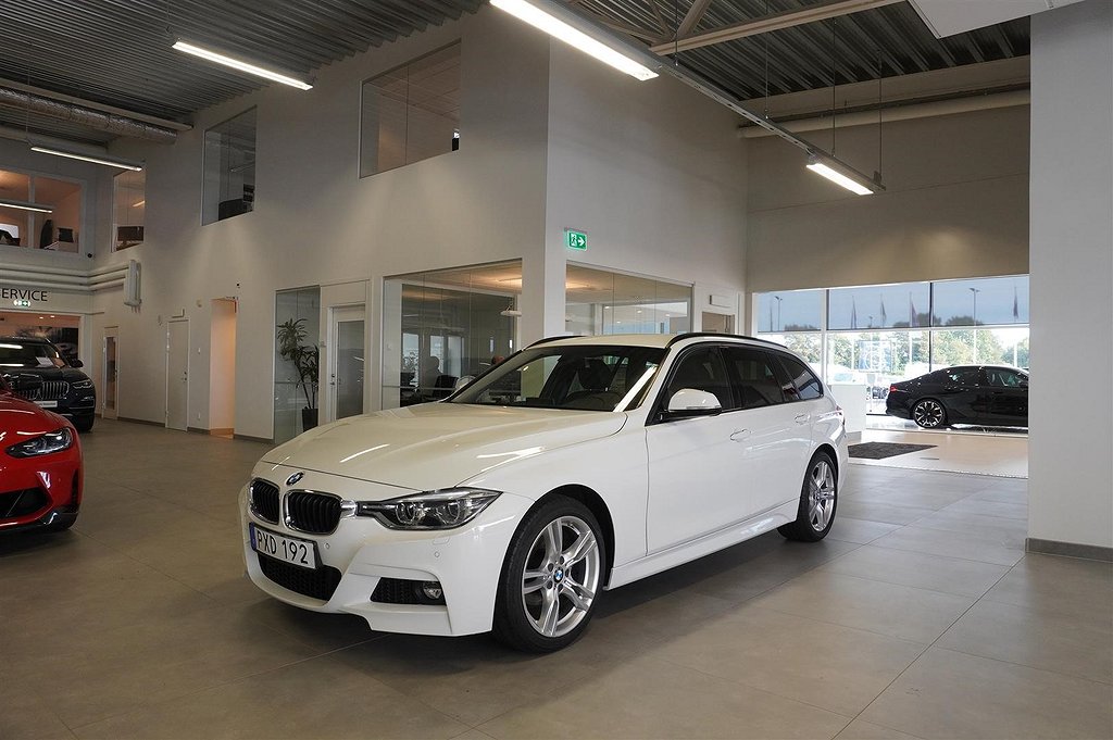 BMW 320 3-serie i xDrive Touring M-Sport Drag Navi HiFi PDC