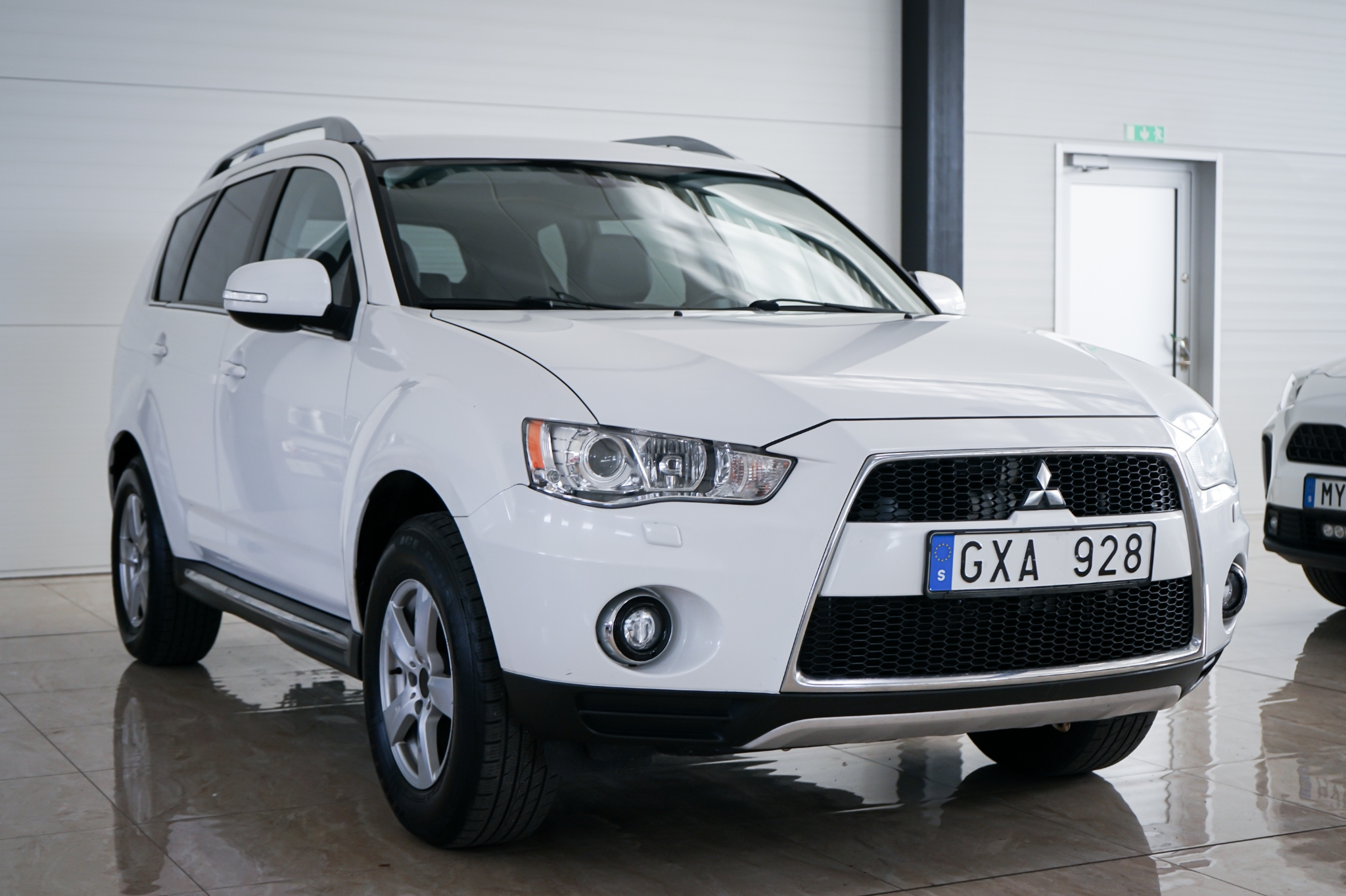 Mitsubishi Outlander 2010, bild 2/60