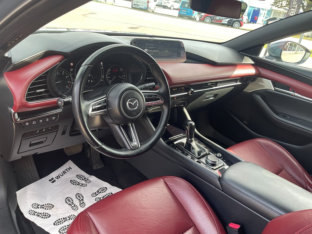 Mazda 3 Cosmo vinröd skinnklädsel 2.0 SKYACTIV-X AWD 180 hk