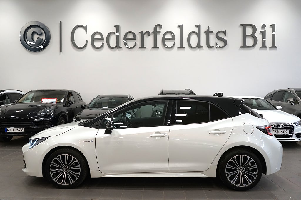 Toyota Corolla Hybrid e-CVT Style Bi-Tone Fullserv 5414mil V-hjul 