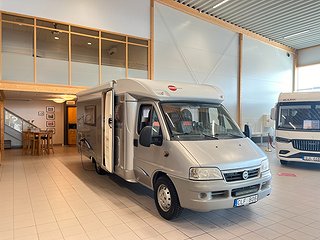 Husbil-halvintegrerad Bürstner T700 2 av 12