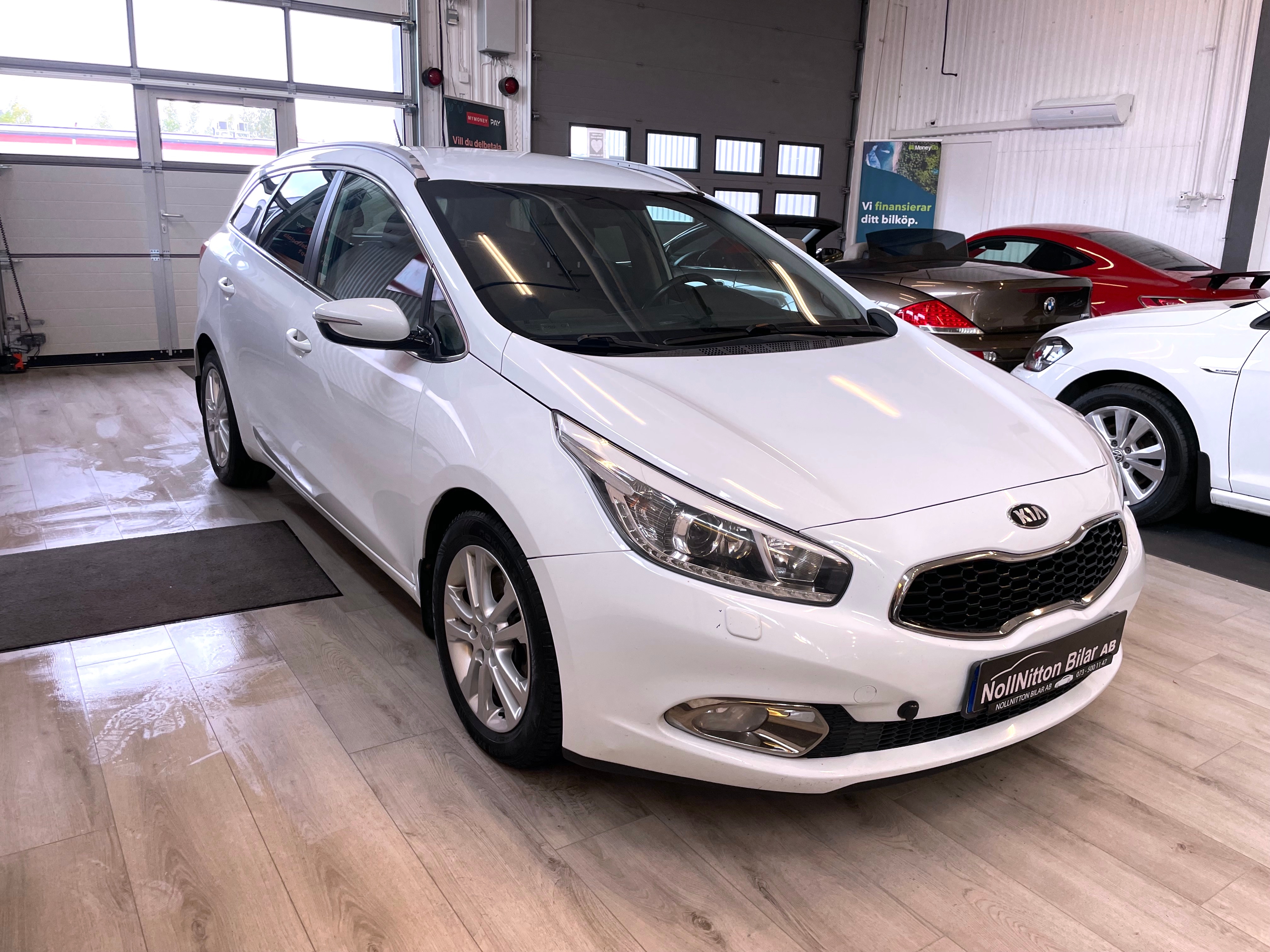 Kia Ceed cee'd_sw 1.6 CRDi 2014, bild 2/39