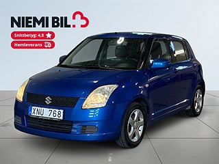 Suzuki Swift 5-dörrar 1.3 DOHC 16V VVT Manuell Drag – bild 1