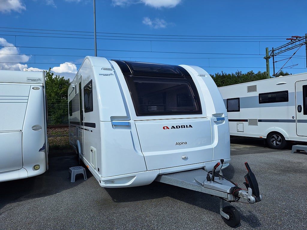 Adria Alpina 573 UP Dubbelbädd, AC, Nytt Tält