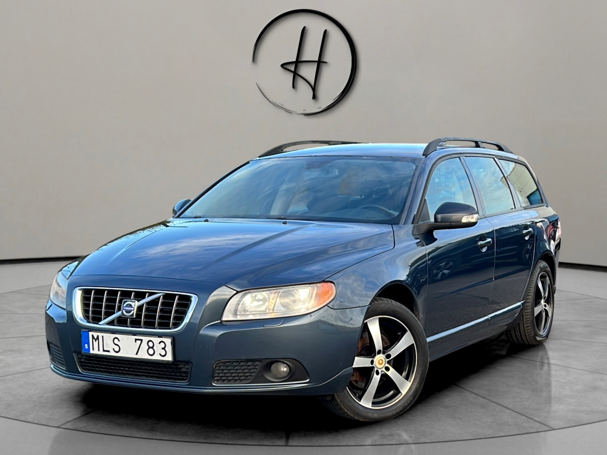 Volvo V70 2009, photo 2/38