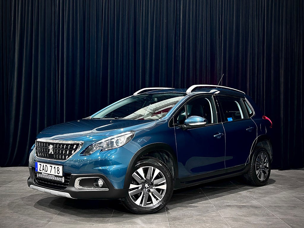 Peugeot 2008 1.2 Allure 1-ÄGARE M-VÄRM SKINN CARPLAY P-SENSORER NAVI