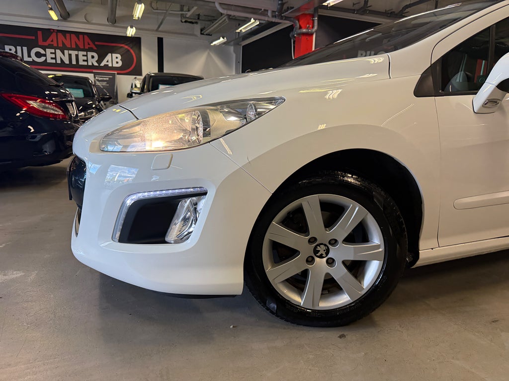 Peugeot 308 sw 2011 - miniatyr 2