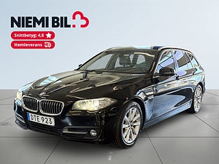 BMW 520d Touring Steptronic S&V-Hjul/Drag/Psens/Helskinn/Navi – bild 1