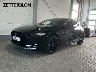 Halvkombi Mazda 3