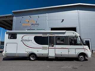 Husbil-integrerad Hymer Eriba 773 IVECO 170HK AUT 1 av 26