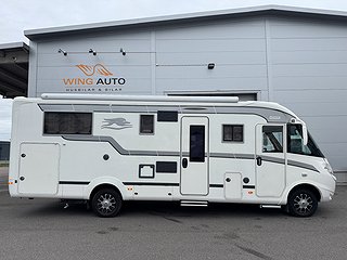 Husbil-integrerad Laika Kreos 8012 IVECO 180HK AUT 1 av 27