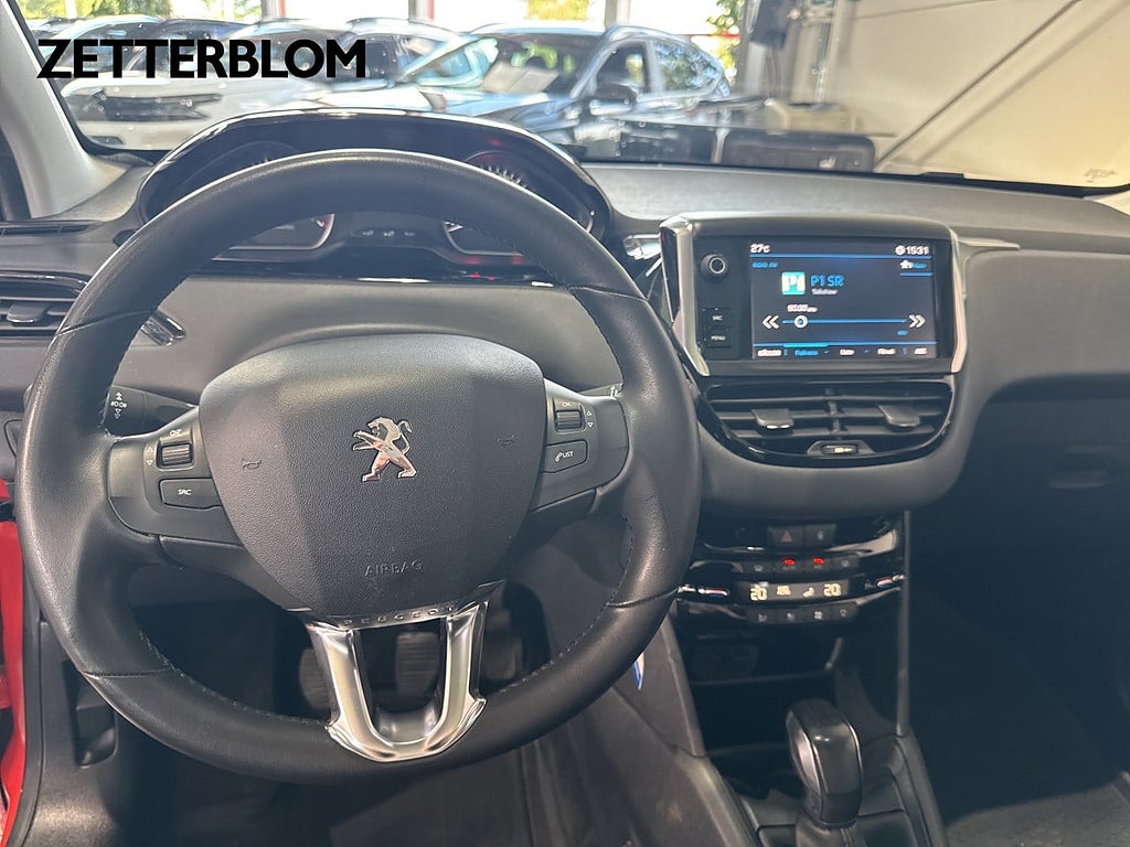 Halvkombi Peugeot 208 12 av 16