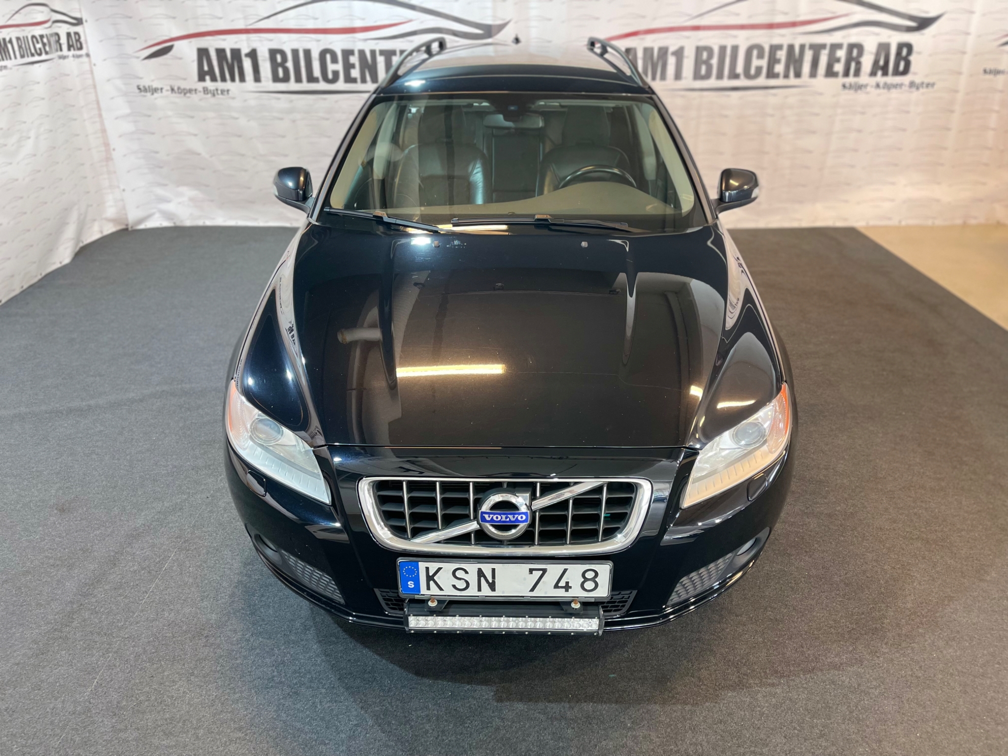 Volvo V70 2011, photo 6/57