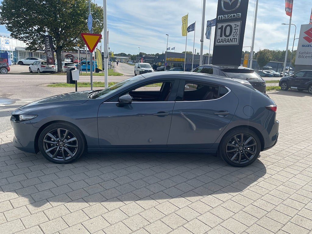 Mazda 3 Cosmo vinröd skinnklädsel 2.0 SKYACTIV-X AWD 180 hk
