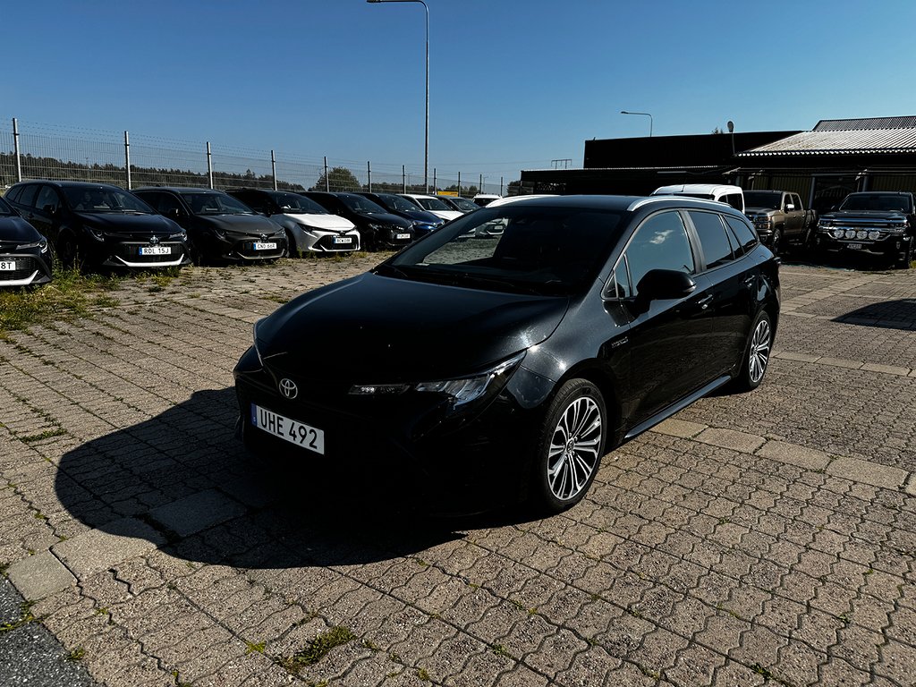 Toyota Corolla TOURING SPORTS STYLE HYBRID LÄDER 2-ÅRS GARANTI