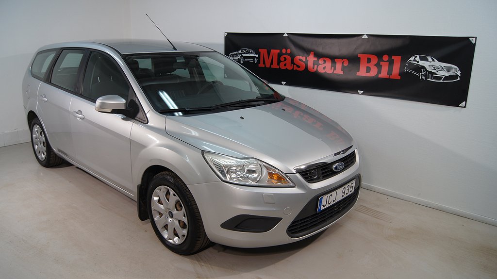 Ford Focus Kombi 1.8 Flexifuel Titanium, Trend 