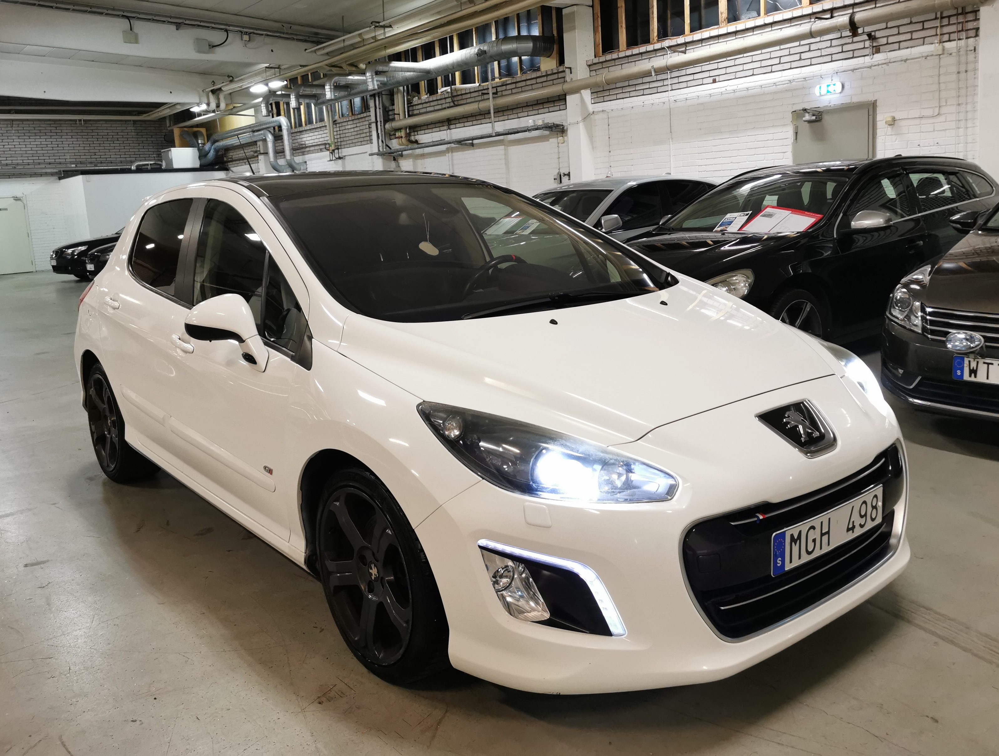 Peugeot 308 2011, photo 2/45