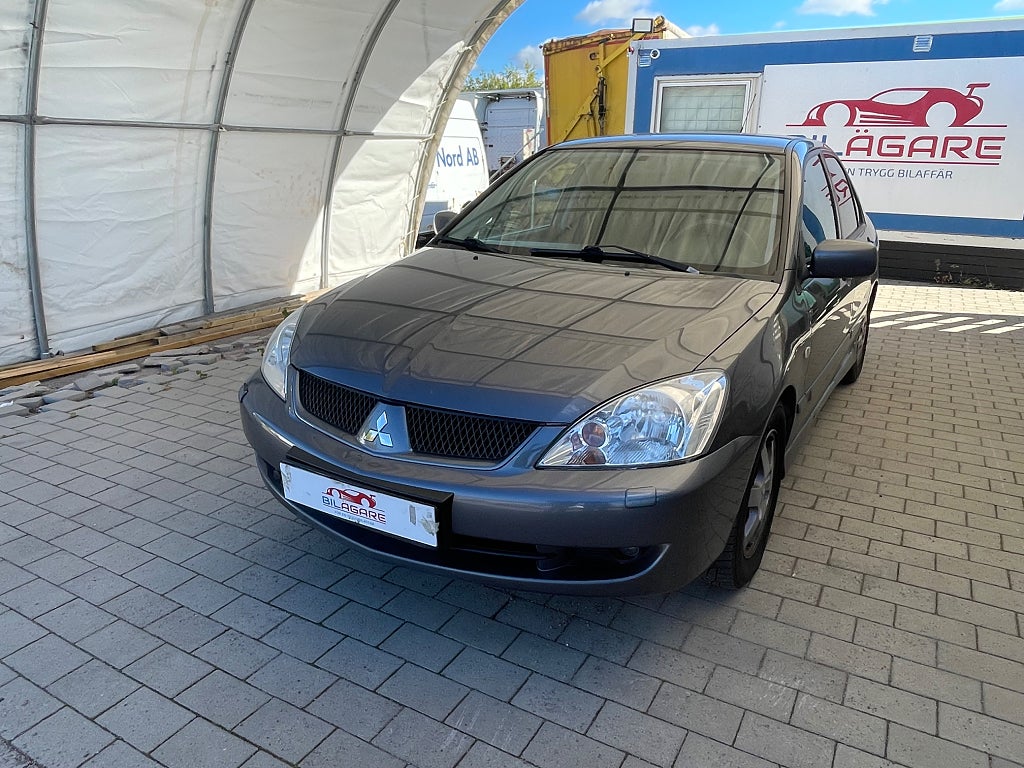Mitsubishi Lancer 1.6 Invite KAMREM-BYTT NYSERVAD BESIKTAD DRAG M-VÄRMARE