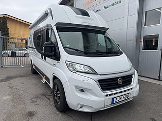 Husbil-halvintegrerad Globe-Traveller Pathfinder Z 150HK Automat! Långbäddar & utfällbar dubbelbädd! 16 av 19