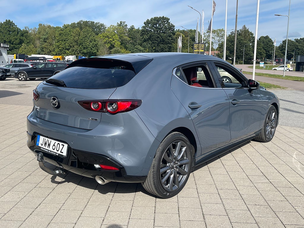 Mazda 3 Cosmo vinröd skinnklädsel 2.0 SKYACTIV-X AWD 180 hk