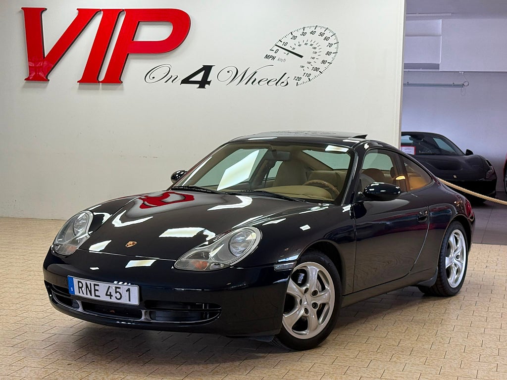 Porsche 911 Carrera 4 (300 hk) TipTronic S Taklucka Sv-Såld 