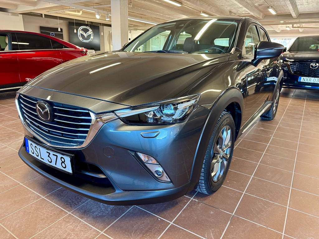Mazda CX-3 2.0 Optimum, delläderklädsel