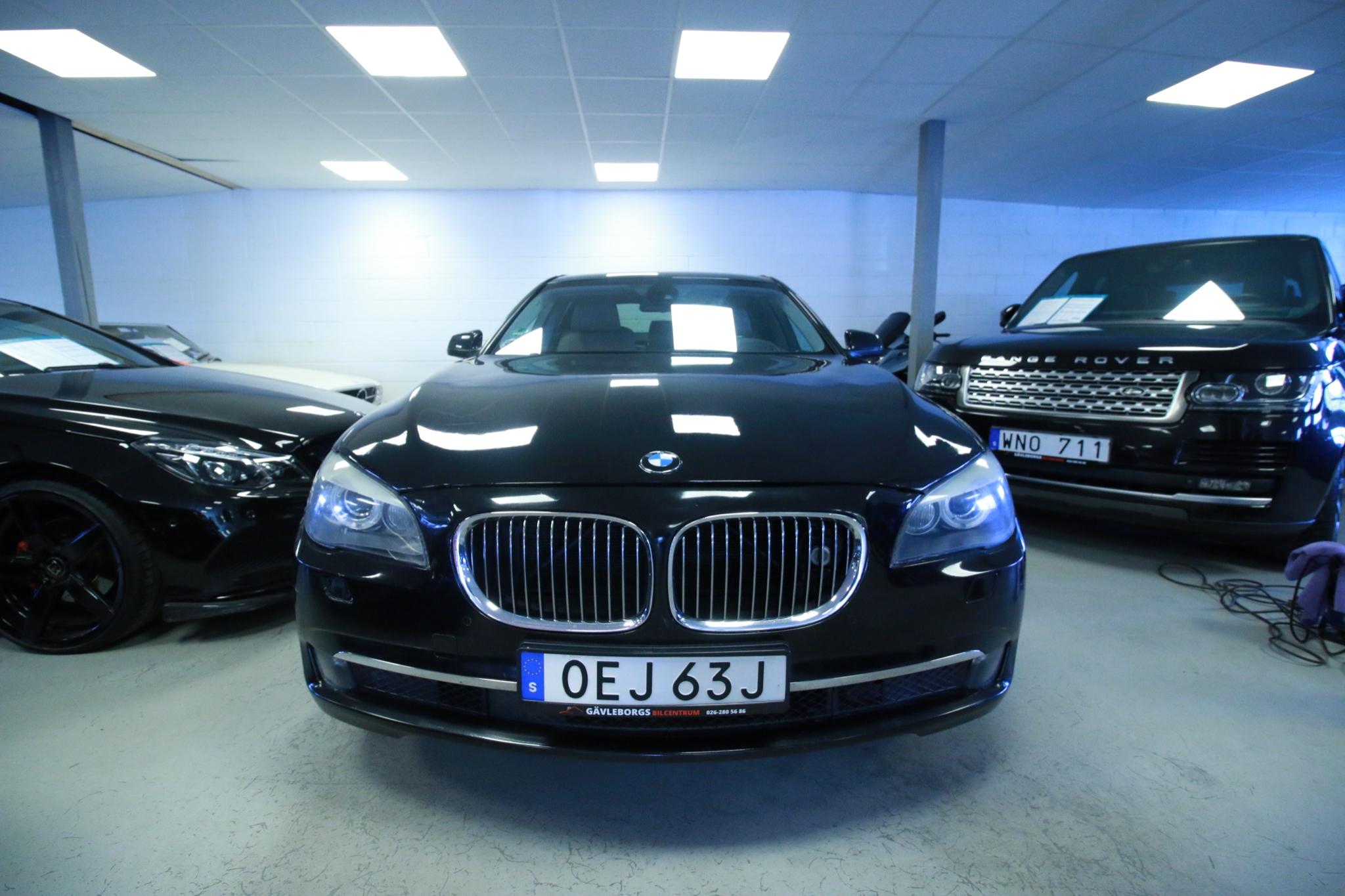 BMW 740 2010, bild 3/40