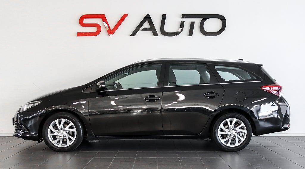 Toyota Auris Touring Sports Hybrid e-CVT Business Plus Navi