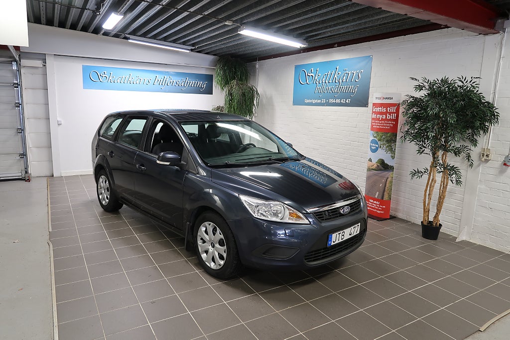 Ford Focus Kombi 1.8 Flexifuel Titanium / Trend