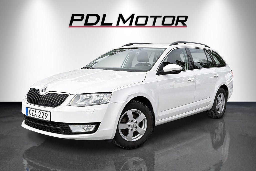 Skoda Octavia Kombi 1.6 TDI 4x4 D-värme Drag SoV hjul