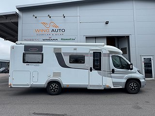 Husbil-halvintegrerad LMC Cruiser Premium T701 AUT 1 av 17