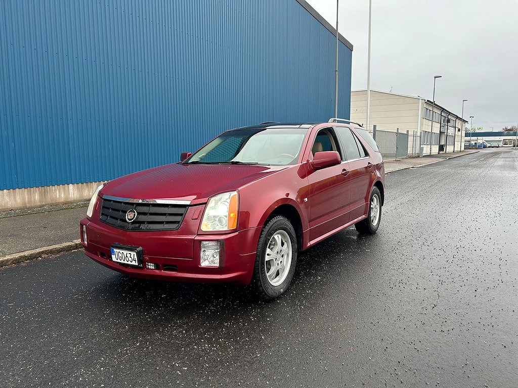 Cadillac SRX 4.6 V8 AWD 7 sitsig 