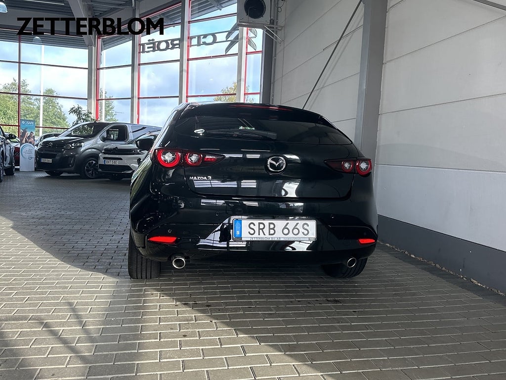 Halvkombi Mazda 3 4 av 15