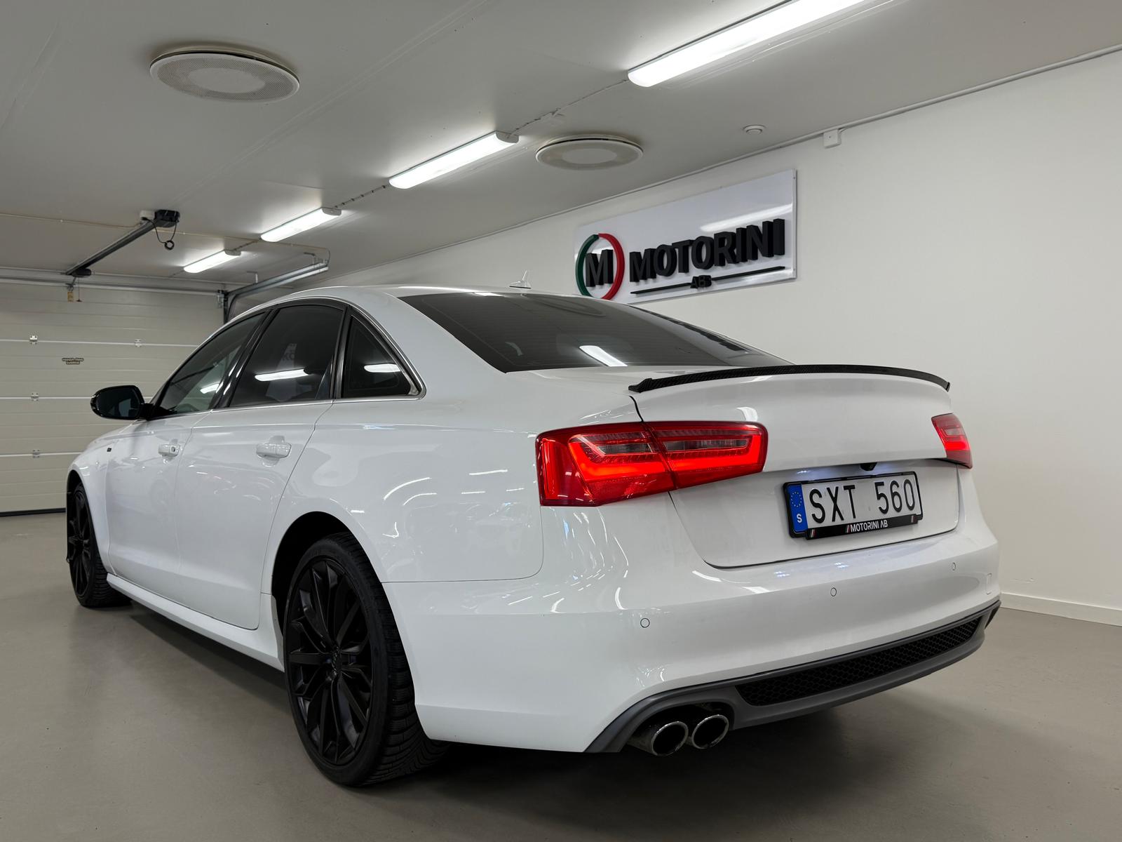 Audi A6 2.0 TDI / S-Line 2014, photo 7/10