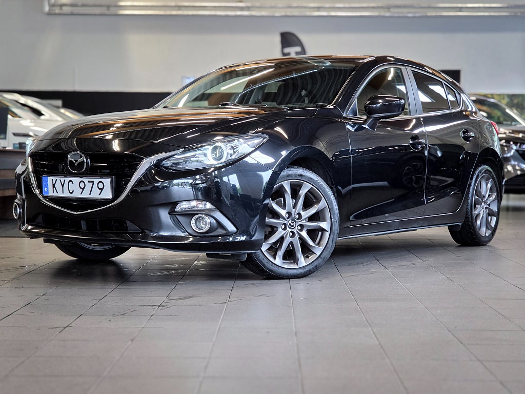 Mazda 3 - bild 1