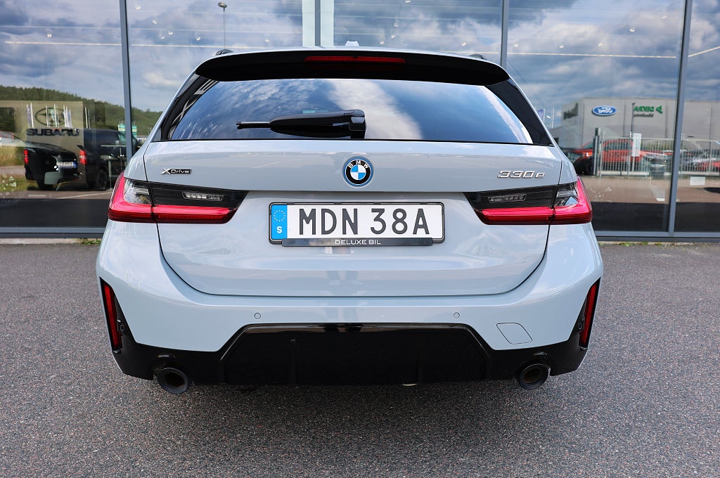 BMW 330e M-sport xDrive Touring Steptronic Drag