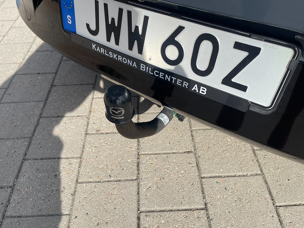 Mazda 3 Cosmo vinröd skinnklädsel 2.0 SKYACTIV-X AWD 180 hk
