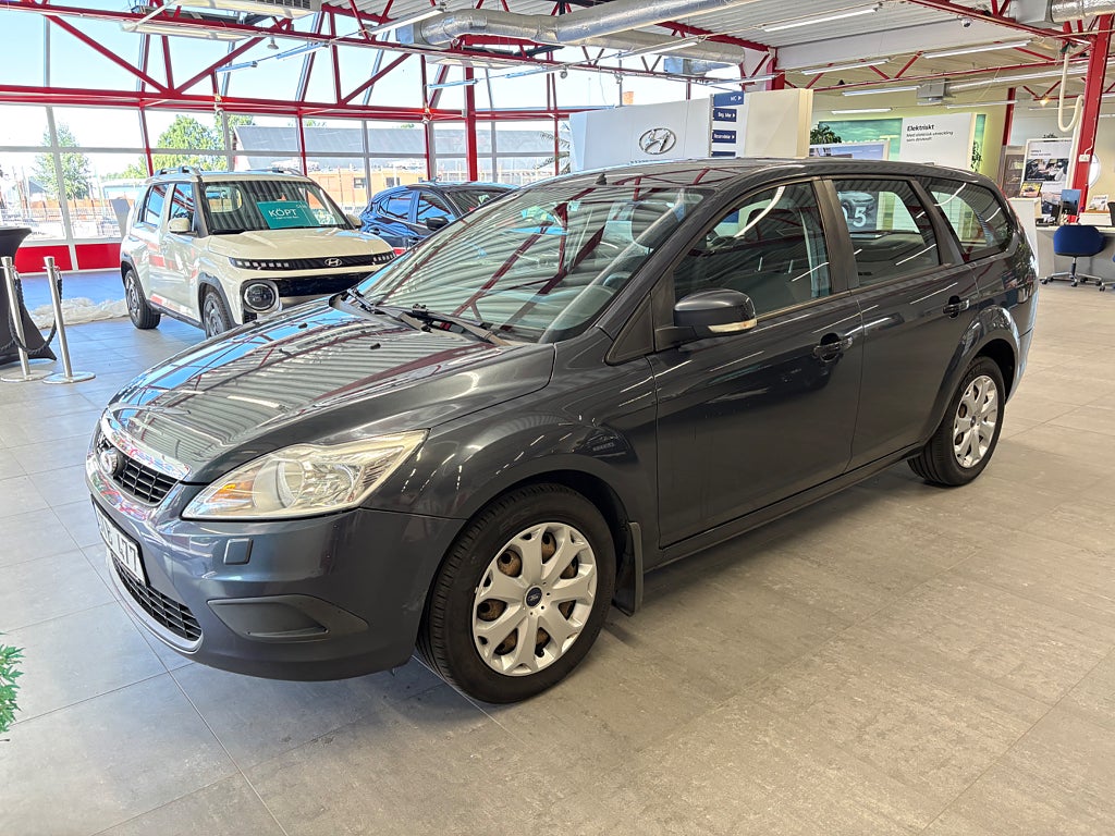 Ford Focus Kombi 1.8 Flexifuel Titanium, Trend 