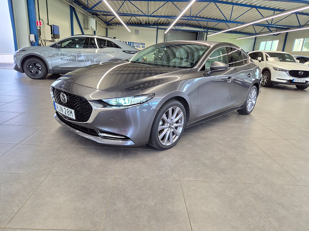 Mazda 3 Sedan 2.0, M Hybrid,  Cosmo, off-white skinnklädsel